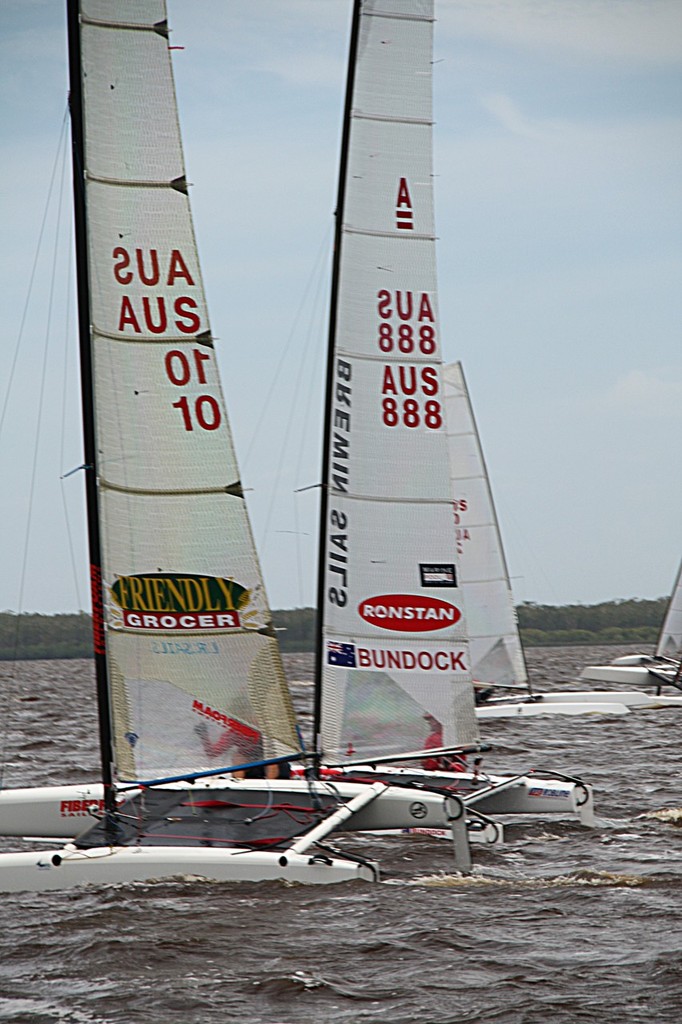 Brad Collett and Darren Bundock battled it out on the final windward leg of race 4 after rounding the bottom mark with successful very skilful gybes - A-Class National race 3 and 4 © Mia Hacker http://www.miahacker.com
